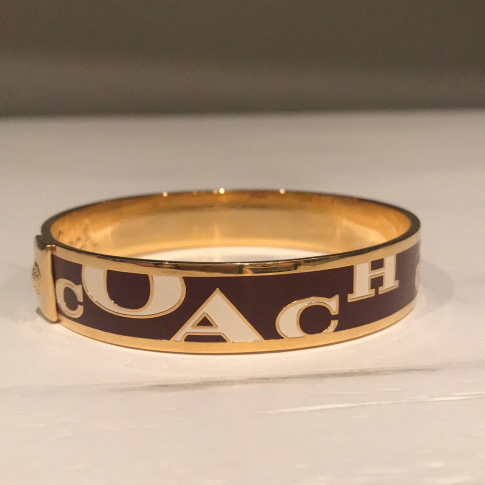 COACH BROWN GOLD BANGLE
